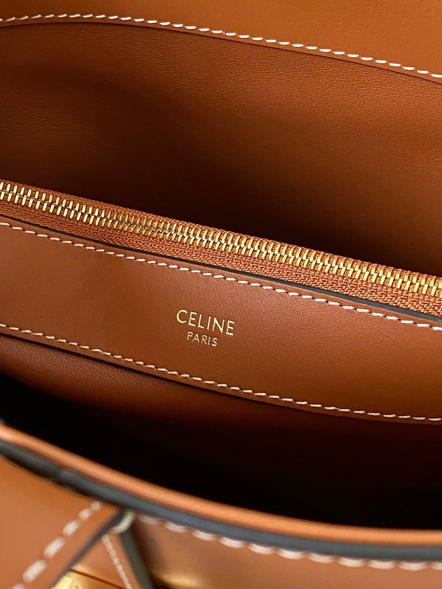 TRIOMPHE 25 BUCKET BAG CINNAMON BROWN CALFSKIN