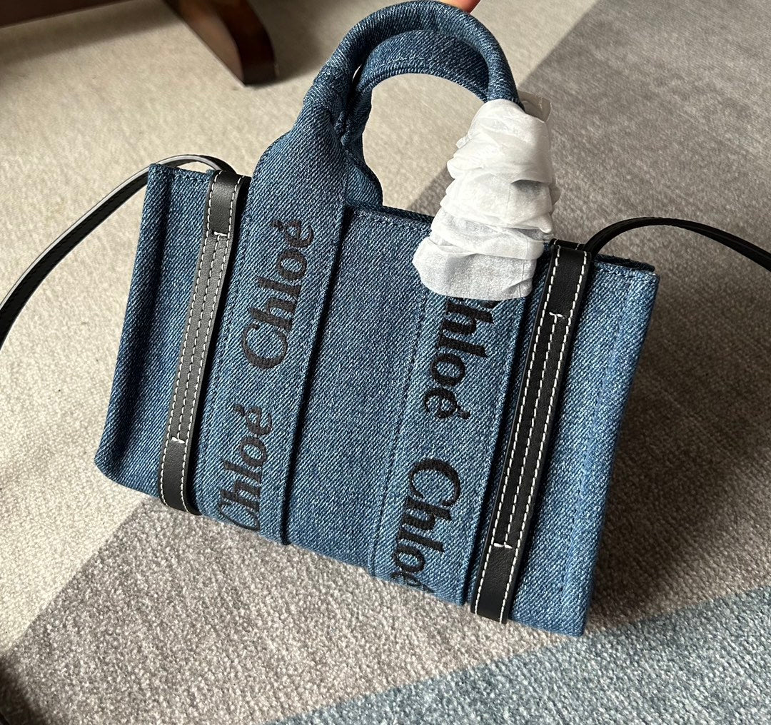 MINI WOODY TOTE BAG 20 IN BLUE DENIM BLACK CALFSKIN