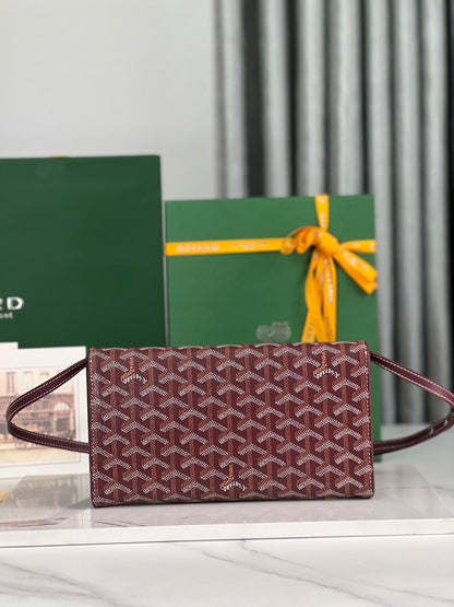 MONTE-CARLO PM CLUTCH 25 IN WINE RED GOYARDINE CANVAS