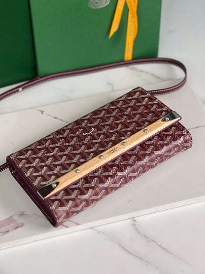 MONTE-CARLO PM CLUTCH 25 IN WINE RED GOYARDINE CANVAS