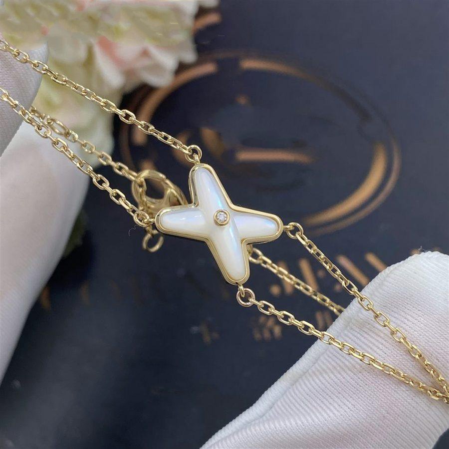 [AURORA]JEUX ARMBAND WEISSES MOP GOLD 1 DIAMANT