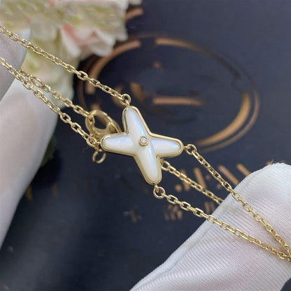 [AURORA]JEUX ARMBAND WEISSES MOP GOLD 1 DIAMANT